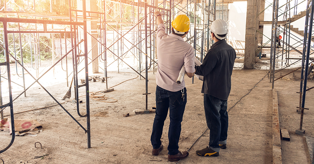 Two,Business,Man,Construction,Site,Engineer,,Effect,Sun,Flare