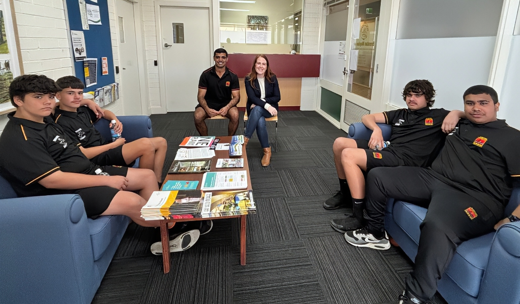 Moree Clontarf Academy director Alex Barker and Shadow Minister for Aboriginal Affairs Felicity Wilson with Clontarf students in Moree on Monday (Image Supplied).
